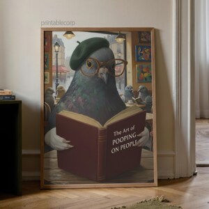 May include: Framed art print featuring a pigeon wearing a beret and glasses, reading a book titled "The Art of Pooping on People." The artwork has a vintage, painterly style with a humorous theme.