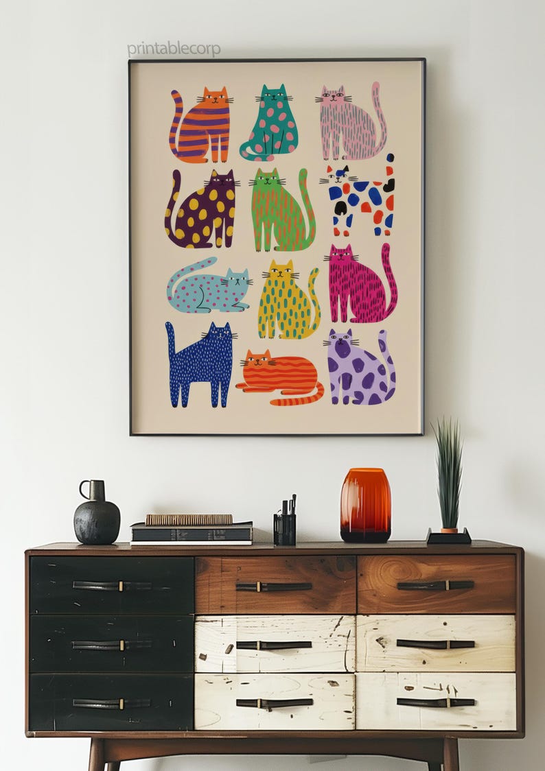 Puede incluir: Una impresi&oacute;n art&iacute;stica enmarcada con una colecci&oacute;n de gatos estilizados en varios colores y patrones. Los gatos est&aacute;n dispuestos en una cuadr&iacute;cula, cada uno mostrando un dise&ntilde;o &uacute;nico. El texto "printablecorp" est&aacute; en la esquina superior izquierda.