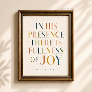May include: Framed art print with the text "IN HIS PRESENCE THERE IS FULLNESS OF JOY" in various colors. The artwork is in a dark brown wooden frame. The text "Psalm 16:11" is at the bottom.