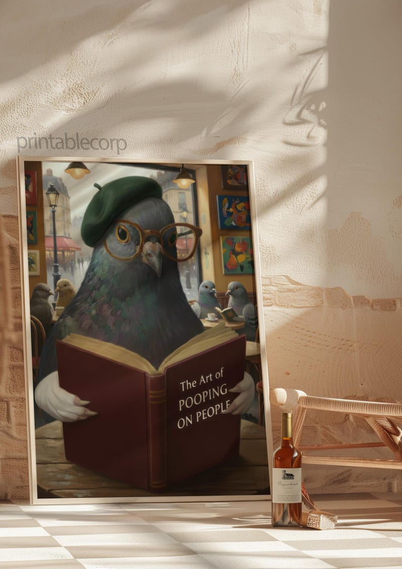 May include: A framed art print featuring a pigeon wearing glasses and a beret, reading a book titled "The Art of Pooping on People." The artwork has a humorous theme, with other pigeons in the background. A bottle of wine is in the foreground.