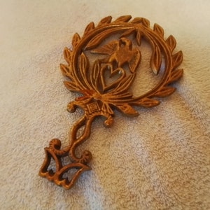 Vintage cast iron trivet--pot rest
