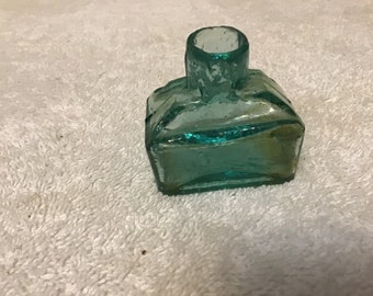 Vintage small emerald green inkwell bottle