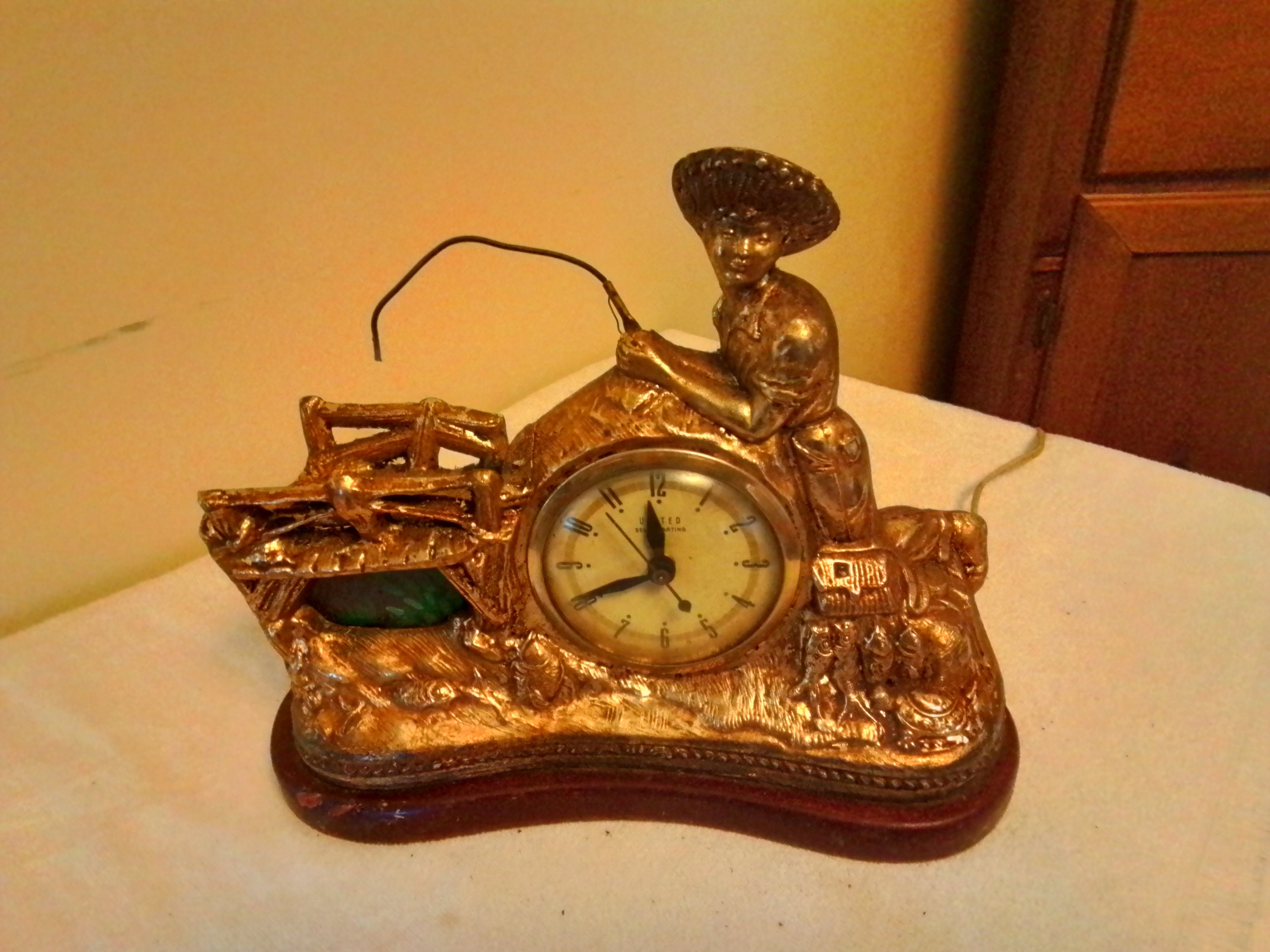 Vintage United Mantel Clock With a Young Boy Fishing. 