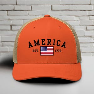 America Est. 1776 Trucker Hat, Black Embroidery, Patriotic Cap for Proud Americans, Perfect Gift for Freedom Lovers