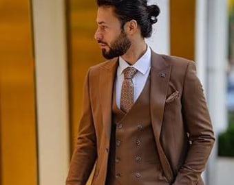 May include: A brown three-piece suit with a patterned tie. The suit jacket has a double-breasted closure and the vest has a v-neck.