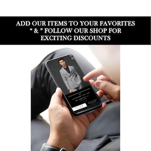 May include: A person holding a smartphone displaying a double-breasted suit. The phone screen shows a gray suit with a black shirt. The image includes the text: "ADD OUR ITEMS TO YOUR FAVORITES & FOLLOW OUR SHOP FOR EXCITING DISCOUNTS."
