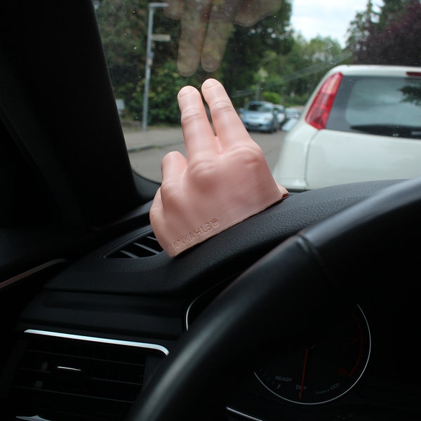 Winkende Hand für das Armaturenbrett im Auto