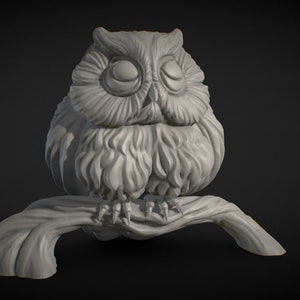 May include: A white ceramic owl sculpture with closed eyes, perched on a branch. The owl has detailed feathers and a realistic appearance.