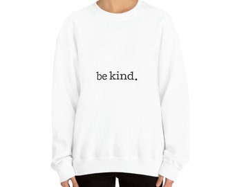 May include: White sweatshirt with the text "be kind." printed in black on the front.