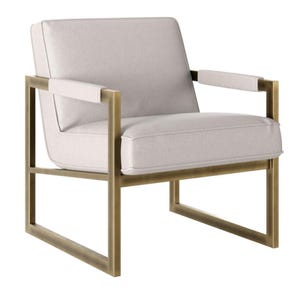 Cream chenille armchair with antique brass frame