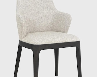 Silla de comedor tapizada con patas de roble negro.