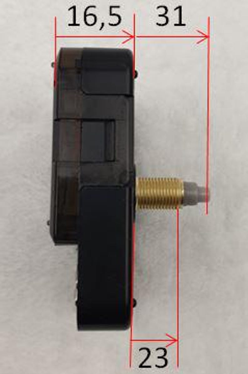 May include: A black clock movement with a gold-colored threaded shaft. The movement measures 16.5 mm wide, 31 mm long, and 23 mm high. The clock mechanism is designed for DIY clock projects and repairs.