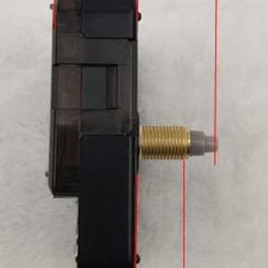 May include: A black clock movement with a gold-colored threaded shaft. The movement measures 6 cm wide, 16.5 cm long, and 14 cm high. The clock mechanism is designed for DIY clock projects.
