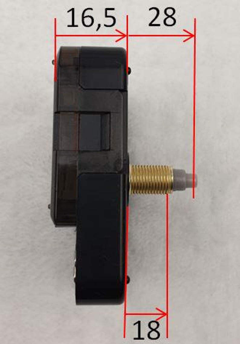 May include: A black clock movement with a gold-colored threaded shaft. The movement measures 16.5 mm wide, 28 mm long, and 18 mm high. The clock movement is designed for use in clocks and other timekeeping devices.