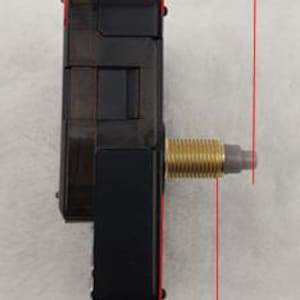 May include: A black clock movement with a gold-colored threaded shaft and a gray adjustment dial. The movement measures 16.5 mm wide, 23 mm long, and 14 mm deep. The clock movement is designed for DIY clock projects.