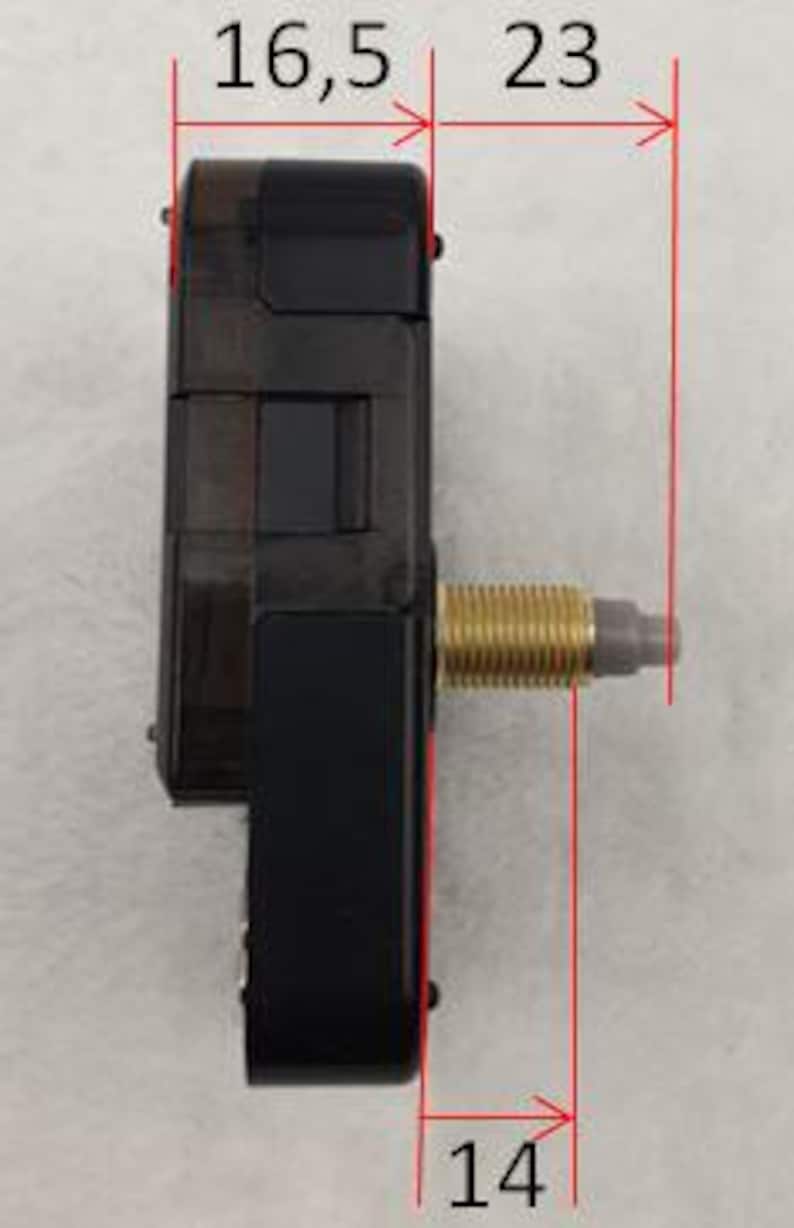 May include: A black clock movement with a gold-colored threaded shaft and a gray adjustment dial. The movement measures 16.5 mm wide, 23 mm long, and 14 mm deep. The clock movement is designed for DIY clock projects.