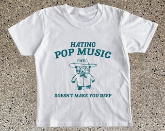 Odiar la música pop no te hace camiseta de bebé profunda, camiseta de bebé Y2k vintage, top de meme de dibujos animados, camiseta de bebé vintage