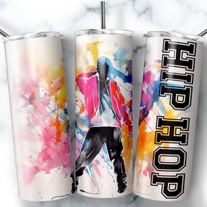 May include: Three stainless steel tumblers with a hip hop theme. One tumbler features a colourful watercolour background with a silhouette of a dancer. Another tumbler has a watercolour background with the word "HIP HOP" in black letters. The third tumbler has a white background with the word "HIP HOP" in black letters.