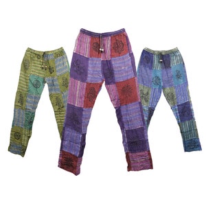 May include: Three pairs of patchwork trousers with a variety of colours and patterns, including green, blue, purple, and red. The trousers have a drawstring waistband and are made of a soft, comfortable fabric.