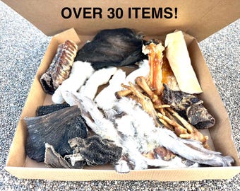 Caja con más de 30 masticables naturales para perros: variedad mixta de patas de pollo, patas de pollo infladas, orejas de vaca, tráquea, cuero cabelludo de res, palitos de arroz.