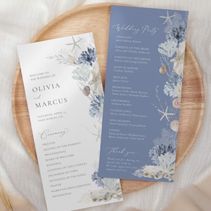 May include: Wedding ceremony programs with a blue and white floral design. The programs include the names Olivia and Marcus, the wedding date, and the ceremony details. The design features starfish and coral.