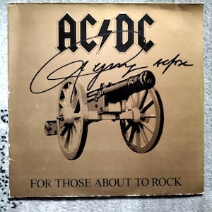 AC/DC &quot;For Those About To Rock&quot; genuine autographed by A.Young!! Certified - Extra rare!! 1981 Reissue 33 Rpm vinyl Lp - MINT