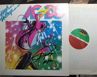 AC/DC - High Voltage  Genuine Autographed by A. Young! with certificate and free update! Extra rare!! 33 Lp Vinyl first cover!