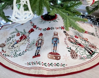 Christmas tree skirt with nutcracker from tapestry fabric with silver lurex. Winter Holiday Decorations