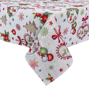 Winter holiday tablecloth in Christmas ornamentation. Tapesrty fabric. New Year Table centerpiece