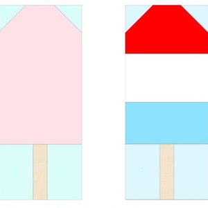 May include: Two fabric blocks shaped like popsicles, one pink and one with a red top, white middle, and blue bottom. Both blocks have a brown stick.