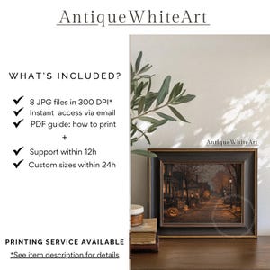 May include: A framed print of a Halloween scene with a street lined with houses and jack-o'-lanterns. The print is in a dark wooden frame. The text "Antique WhiteArt" is at the top and on the frame. The image includes a list of what's included.