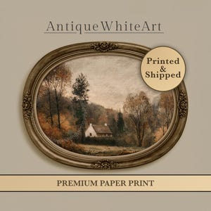 May include: An oval-framed landscape art print featuring a small cottage nestled among autumn-toned trees under a cloudy sky. The frame is ornate and metallic. Text on the image reads AntiqueWhiteArt, Printed & Shipped, and PREMIUM PAPER PRINT.