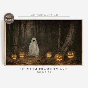 May include: A framed Halloween-themed artwork featuring a white ghost and several carved pumpkins with glowing faces in a dark forest setting. The text "ANTIQUE WHITE ART" and "PREMIUM FRAME TV ART" are visible.