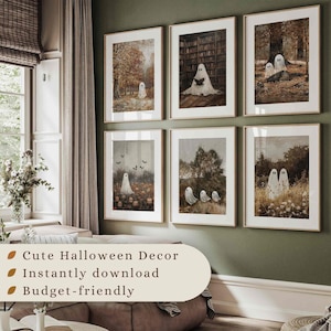 May include: A set of six framed wall art prints featuring ghosts in various settings, including a forest, a library, and a pumpkin patch. The prints have a muted, earthy color palette with white ghosts and dark, moody backgrounds in each frame.