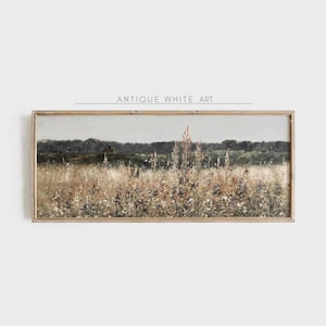May include: A framed landscape painting depicting a field of wildflowers in shades of brown, green, and white. The painting has a rustic, vintage feel and is perfect for adding a touch of nature to any room.