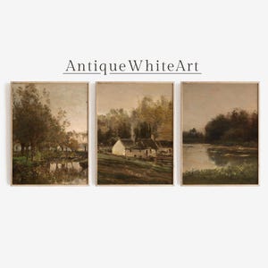 May include: A triptych of framed landscape paintings. The artwork features muted tones of brown, green, and beige. The paintings depict scenes of nature, including trees, water, and a building. The text "Antique White Art" is above the paintings.