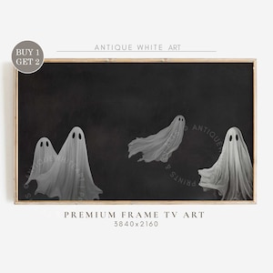 May include: Three white ghosts on a black background. The ghosts are semi-transparent and have a vintage look. The image is framed in a wooden frame.