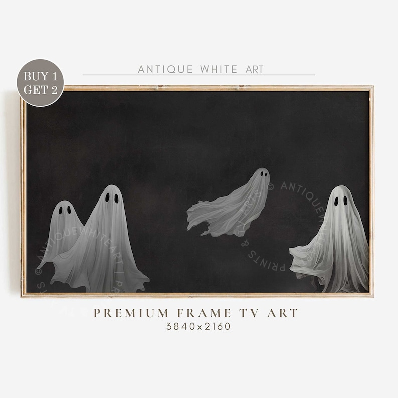 May include: Three white ghosts on a black background. The ghosts are semi-transparent and have a vintage look. The image is framed in a wooden frame.