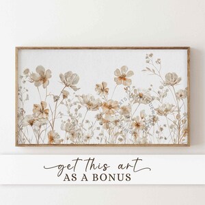 May include: A watercolor painting of a field of wildflowers in shades of brown and beige. The flowers are arranged in a horizontal line across the canvas, with a white background.
