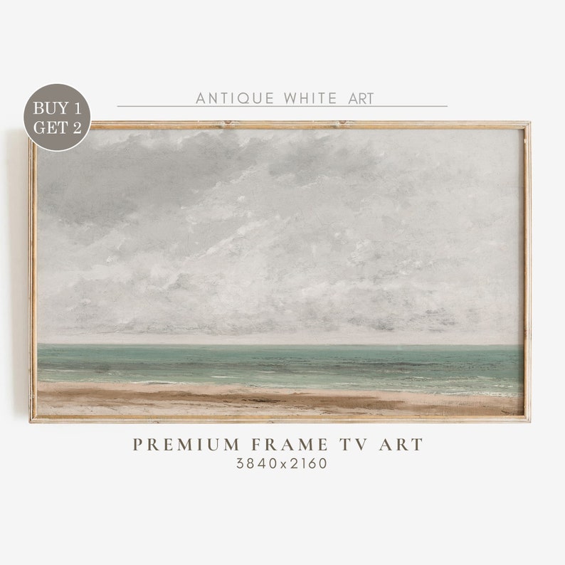 May include: A framed painting of a seascape with a cloudy sky and a calm ocean. The painting is in a light wood frame and has the text "Antique White Art" and "Premium Frame TV Art 3840x2160" printed below it.