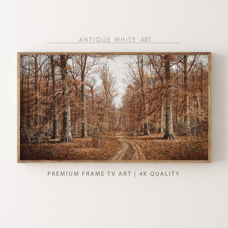 May include: A framed landscape print featuring a forest scene with a dirt path winding through the trees. The artwork has a warm color palette of browns and tans, with the text "ANTIQUE WHITE ART" and "PREMIUM FRAME TV ART | 4K QUALITY".