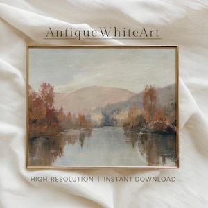 May include: A framed landscape painting with a gold frame. The artwork depicts a serene river scene with mountains in the background and trees in autumn colors. The text "Antique WhiteArt" and "HIGH-RESOLUTION | INSTANT DOWNLOAD" are visible.