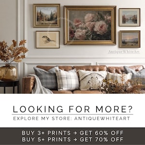 May include: A gallery wall featuring framed art prints with gold frames. The prints depict landscapes, a bird, and a floral still life. A brown leather sofa with decorative pillows sits below the artwork. The text "LOOKING FOR MORE?" and "EXPLORE MY STORE: ANTIQUEWHITEART" are visible.