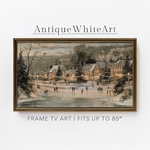 May include: Framed vintage artwork showing a winter scene with people ice skating on a frozen pond. The artwork features a village with lit houses and string lights. The text "Antique White Art" is at the top. The frame fits up to 216 cm.