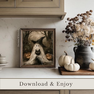 May include: A framed wall art print featuring a ghost wearing a black pointed hat and holding a black cat, set in a dark forest with two glowing jack-o'-lanterns. The text AntiqueWhiteArt is visible on the left side of the print frame.