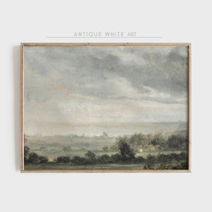 May include: A framed painting of a landscape with a cloudy sky and a field of trees in the foreground. The painting is in a muted color palette of blues, greens, and browns.