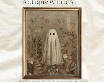 Könnte beinhalten: Ein gerahmter Druck, der einen Geist in einem weißen Laken mit schwarzen Augen inmitten von beigem und braunem Laub zeigt. Das Kunstwerk hat eine gedämpfte Farbpalette, mit dem Text "Antique White Art" oben und "HIGH-RESOLUTION | INSTANT DOWNLOAD" unten.