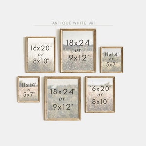 May include: A wall gallery featuring five framed prints of a landscape scene in muted tones. The prints are available in two sizes: 18x24 inches or 9x12 inches, and 16x20 inches or 8x10 inches. The prints are arranged in a staggered pattern on a white wall.