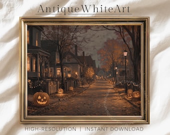 May include: A framed print of a Halloween scene. The artwork depicts a street lined with houses and lit jack-o'-lanterns. The text "Antique White Art" is at the top, and "HIGH-RESOLUTION | INSTANT DOWNLOAD" is at the bottom.