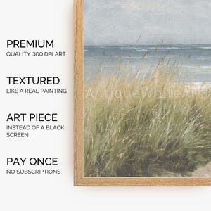 May include: A framed print of a seascape painting with a textured surface. The painting depicts a close-up of tall green grass blowing in the wind with a blue ocean in the background.